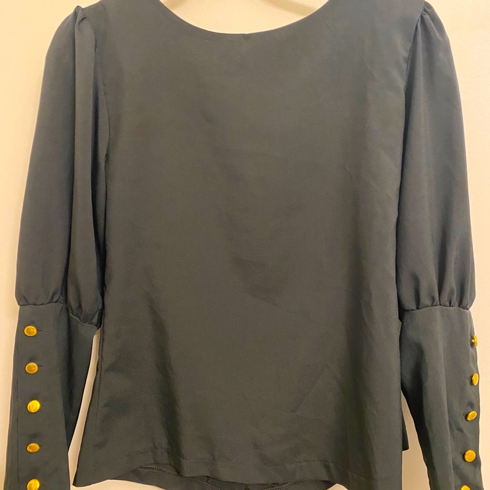 Blouse with button detail on arms and back